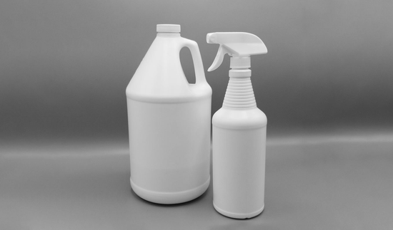 Two white bottles against a grey background