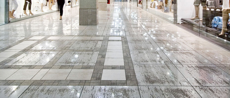 Photo of a shiny tile floor from a mall.